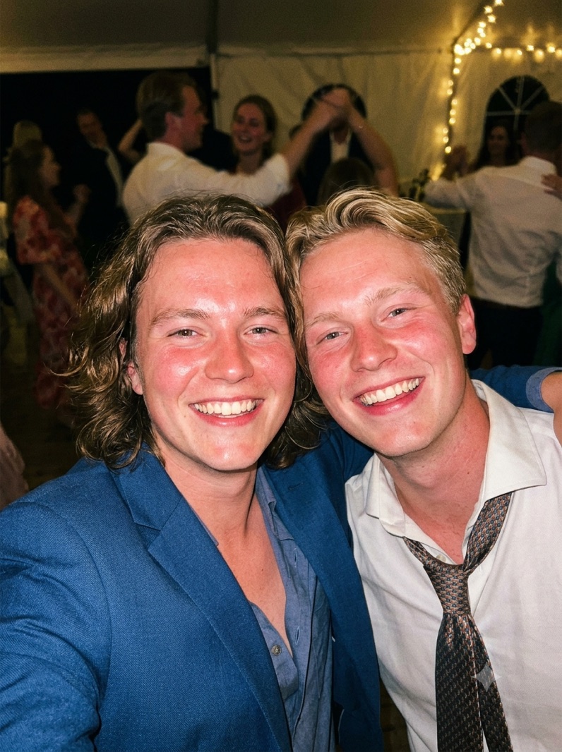 Two friends, one dance floor, and a tie that had a long night ahead of it.